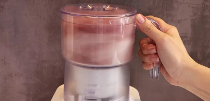 Grind the pork using a meat grinder. Grind it moderately for about 30 seconds.
