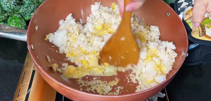 Pour in beaten eggs, fry until dry.