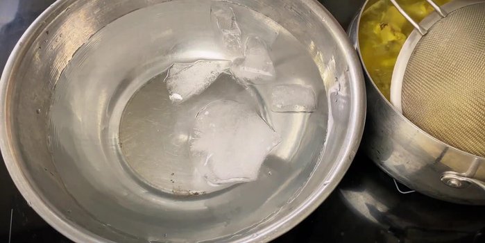 Immediately transfer chicken feet to ice water to maintain crispiness.