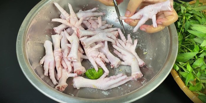 Cut off chicken foot nails.