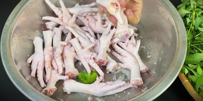Cut chicken legs in half.