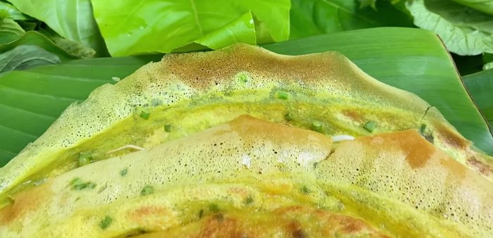 Serve: Enjoy your Banh Xeo with the prepared fish sauce and your favorite fresh vegetables.