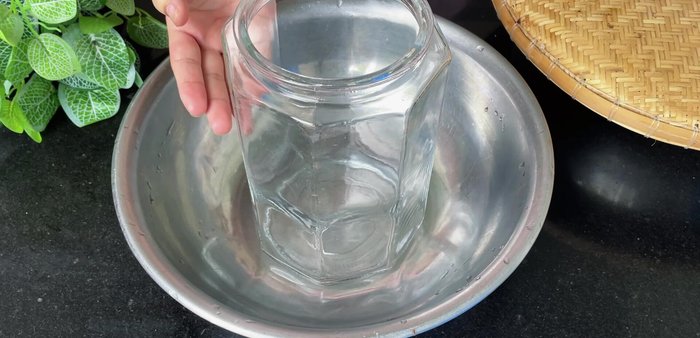 Sterilize glass jars by blanching them in boiling water.