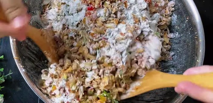 Add sticky rice flour and sauce: Add sticky rice flour and stir to coat evenly. Add the remaining sauce and stir until combined.