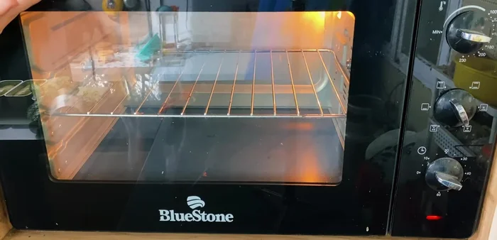 Bake: Preheat oven to 160°C (320°F) with fan for 10 minutes. Bake the bread for 20 minutes until golden brown.