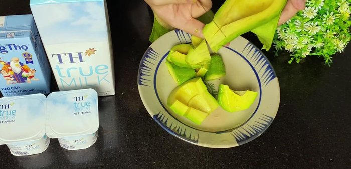Peel and pit the avocados. Cut into small pieces for easier blending.