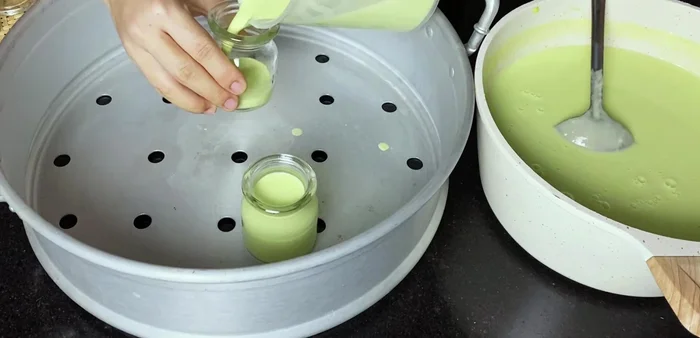 Pour the mixture into the sterilized jars.