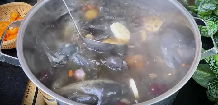 Add lotus root: Add lotus root and simmer until soft. Add rock sugar, seasoning powder.