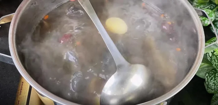 Add carrots: After simmering for about 50-60 minutes, add carrots.