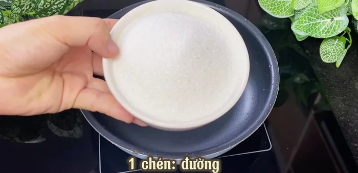 Make the fish sauce mixture: In a pan, combine sugar and fish sauce. Cook over medium heat until the sugar melts completely. Reduce heat to low and cook until the mixture becomes slightly sticky. Remove from heat and let it cool completely.