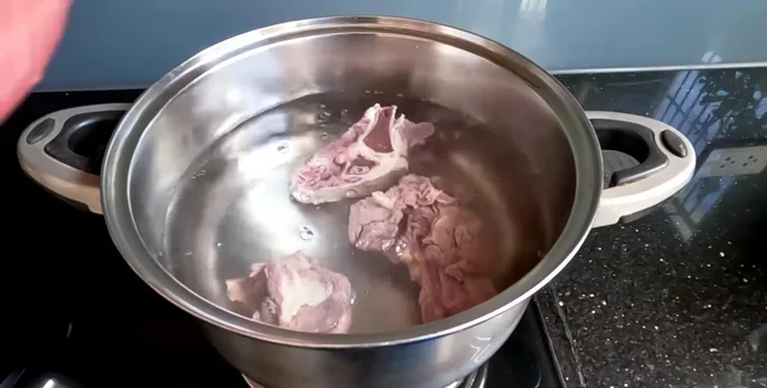 Blanch the beef ribs in boiling water for about 10 minutes. Remove, wash again, and set aside.