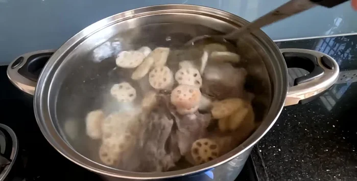 Add lotus root and simmer for about 30 minutes, then add lotus seeds and continue to simmer until the lotus seeds are soft (approximately 30 more minutes).