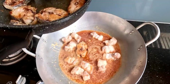 Simmer until the sauce is almost gone (about 20-25 minutes). Add the green bananas and shallots during the last part of the simmering process.