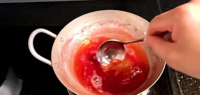Stir until gelatin dissolves, then let the strawberry mixture cool for 30-40 minutes in the refrigerator (450.68).