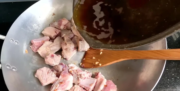 Pour the coconut sauce over the ribs. Reduce heat and simmer for 25-30 minutes, or until the ribs are tender.