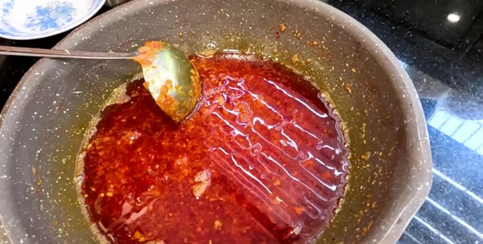 Stir well. Let the satay cool slightly, then add pepper and dried chili to taste. [288.919]