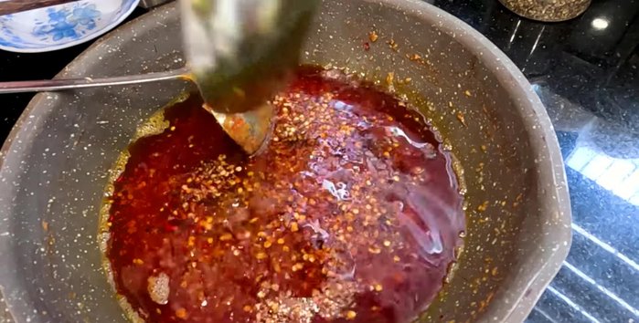 Finally, add 100ml of fried shallot oil (or cooking oil if unavailable). Stir well to combine. [312.72]