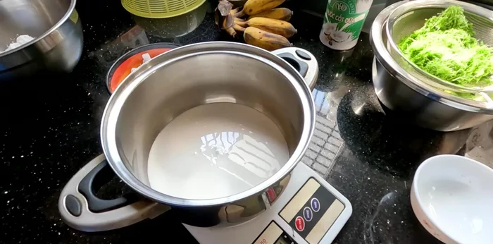 Mix the flours. In a bowl, combine all-purpose flour, tapioca starch and rice flour. Add coconut milk and boiling water, stir until dissolved. Let this mixture rest for 30 minutes to 1 hour to allow the flour to expand.