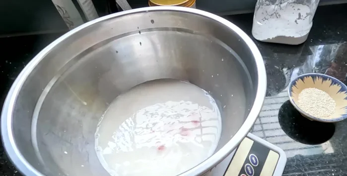 In a pot, combine the onion-garlic mixture, tomato sauce, chili sauce, soy sauce, white wine, and reserved sesame juice.