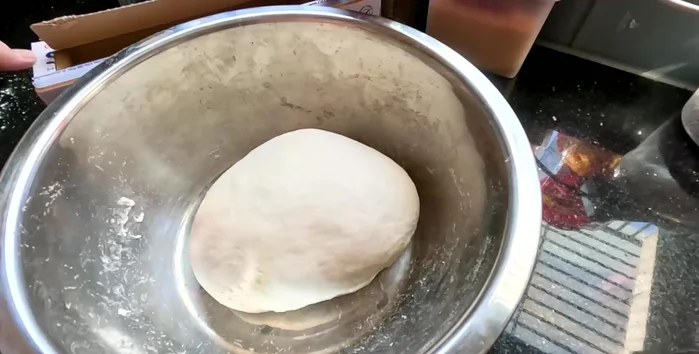 Wrap the dough in plastic wrap and let it ferment for about 1 hour.