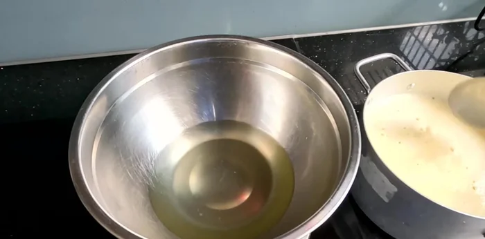 Stir the corn milk thoroughly to break down any starch that has settled at the bottom of the pot.