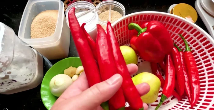 Prepare the ingredients: Wash and cut all vegetables. Remove seeds from chili peppers if you prefer less spiciness. Remove the core and seeds from pears. Remove seeds from bell pepper. Finely chop onion, garlic, and ginger.