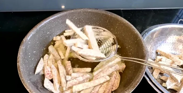 Drain and cool: Remove the taro from the oil and let it cool completely (about 20-25 minutes).