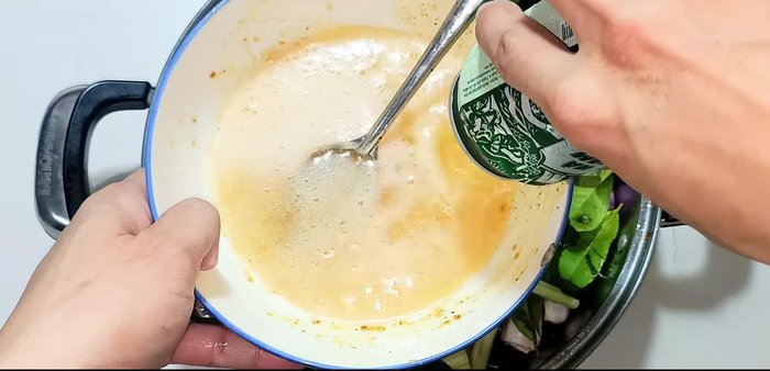 Steam the chicken: Add beer to the pot, ensuring it doesn't pour directly onto the chicken. Cover and steam over medium heat for 10 minutes.