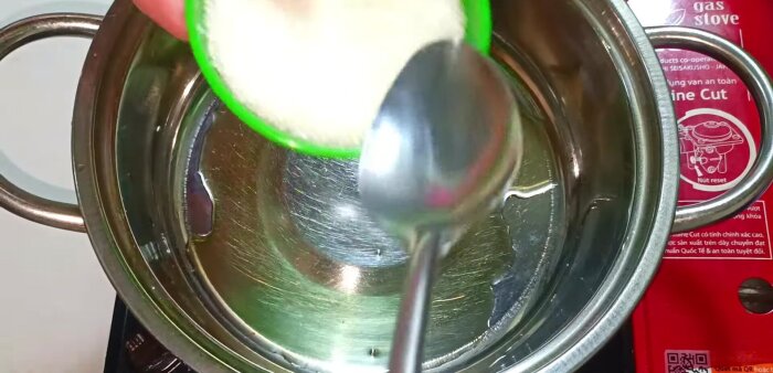 Combine fish sauce and sugar in a pot and cook until the sugar dissolves.