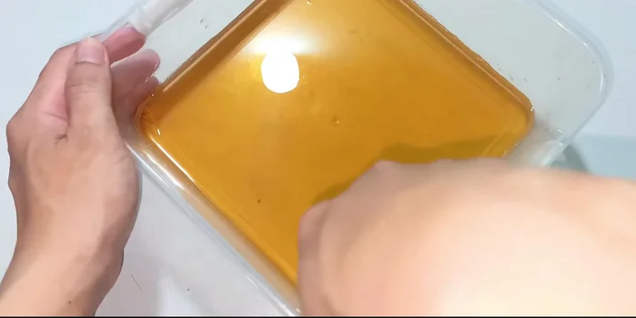 Once set, cut the jelly into small cubes using a sharp knife.