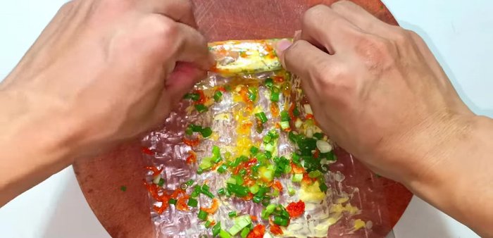Roll up the rice paper tightly.