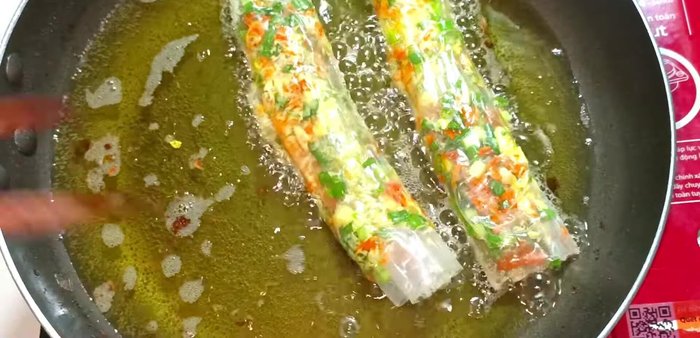 Continue frying the remaining rice paper rolls until all are golden and crispy.