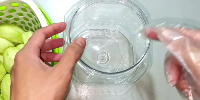 Combine and soak: Add the drained mangoes, chilies, and cooled sugar syrup into a clean container. Ensure the mangoes are fully submerged in the syrup.