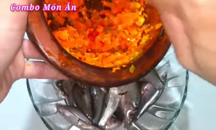 Marinate the fish: In a bowl, combine half of the pureed aromatics with the fish, sugar, salt, pepper, and fish sauce. Marinate for 15 minutes.
