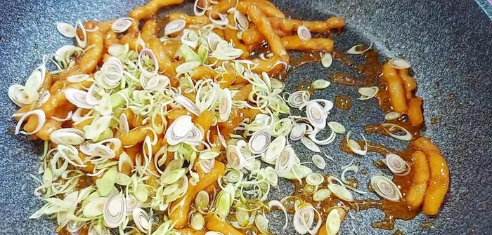 Once cooled, slice the lemongrass and mix it in.