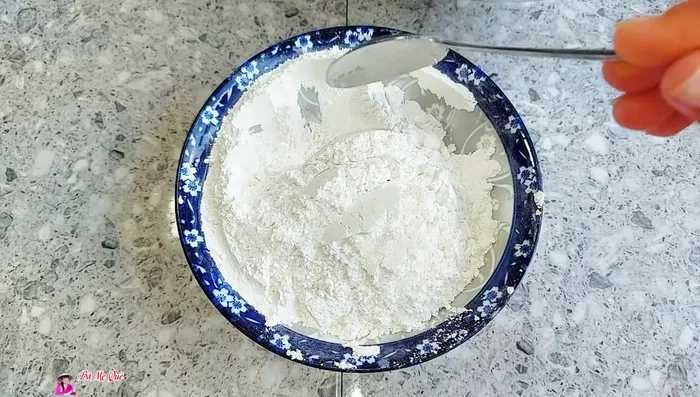 Combine the remaining sticky rice flour with sugar (optional), tapioca starch, and wheat flour. Mix thoroughly until a smooth dough forms. No extra water is needed.