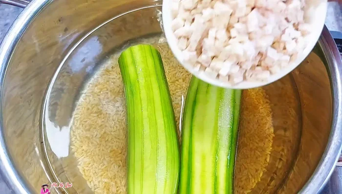 Cut the taro into small cubes and add it to the squash pot.