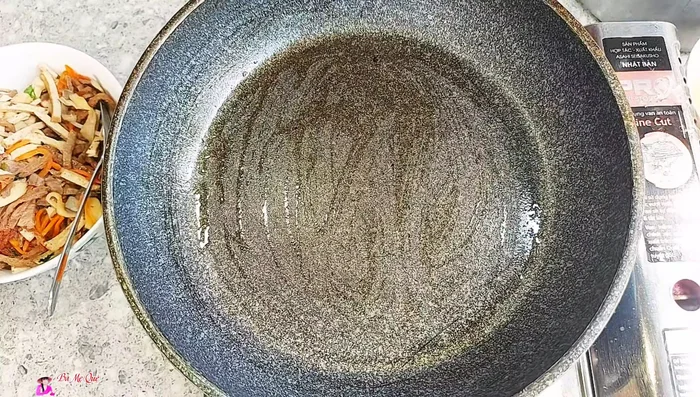 Pour the batter: Pour the batter onto the hot pan, creating a circle. Add green beans and bean sprouts on top, cover and cook until the bean sprouts are cooked.