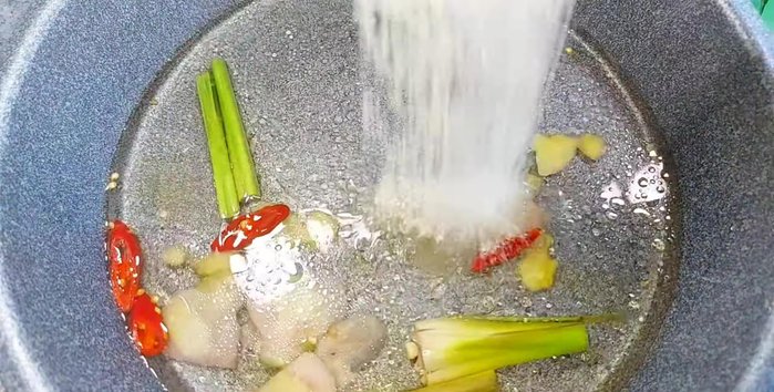 Add water, sugar, vegetarian seasoning, tamarind juice, chili sauce, and tomato sauce. Stir well.