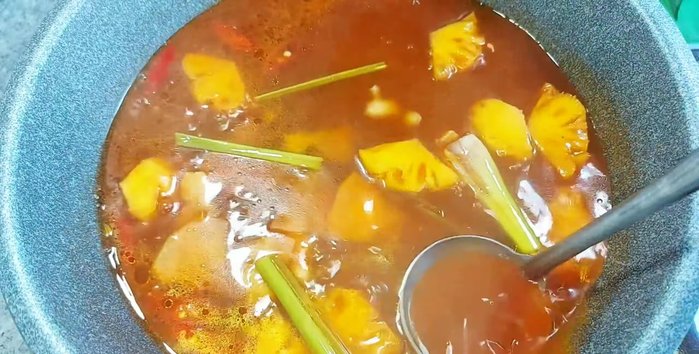 Add vegetarian fish sauce to taste. Adjust seasoning as needed.