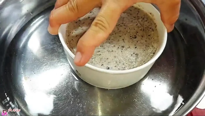 Steam the mixture for 1 hour, or until a toothpick inserted into the center comes out clean.