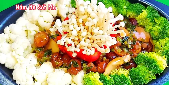 Make the Tamarind Mushroom Sauce: Choose your favorite mushrooms and crunchy vegetables. The sauce recipe is detailed in the video's comments.