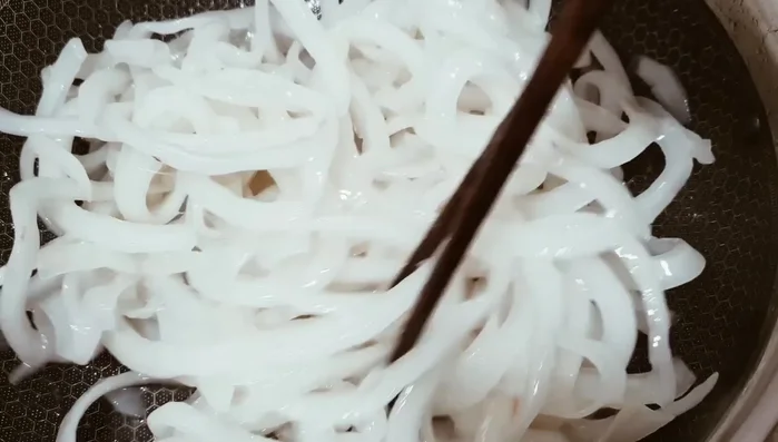 Continue stirring until the sugar is completely dry and crystallizes.