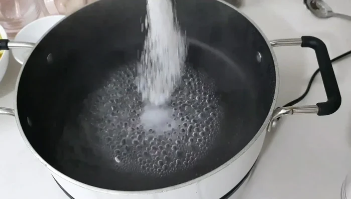Boil potatoes with salt and sugar until soft. Puree the potatoes and set aside.