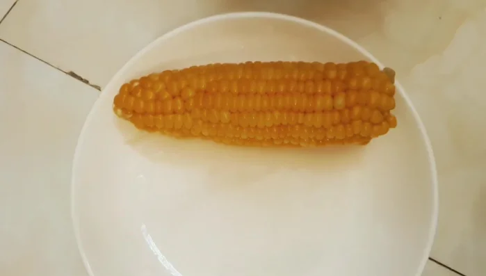Remove the corn from the pot.