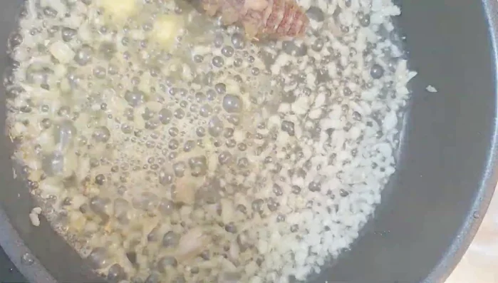Add mantis shrimp to the pan and stir well.