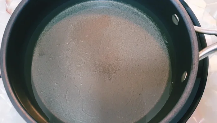 Coat mantis shrimp in flour to prevent sticking and ensure a crispy texture.