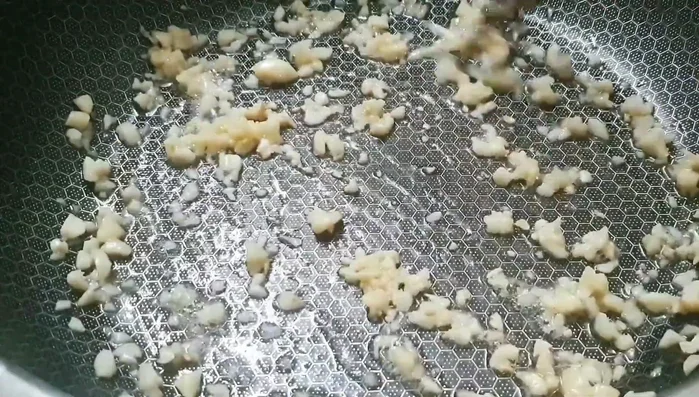 Sauté garlic.