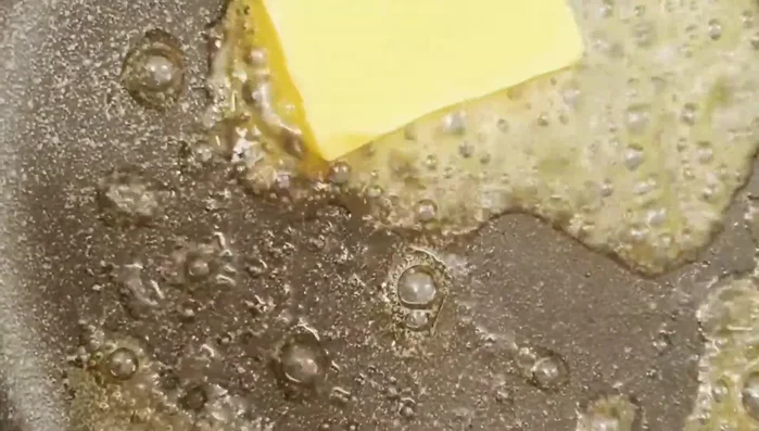 Add butter to the mashed potatoes and mix well.