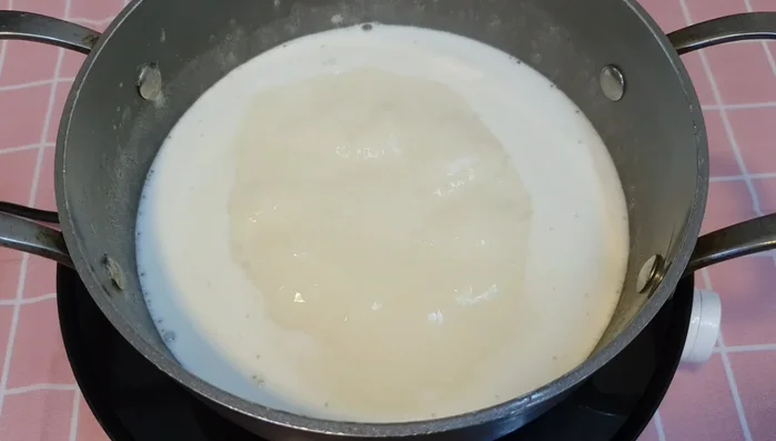 Transfer the cooled mixture to a container, cover, and refrigerate for 3-4 hours to solidify.